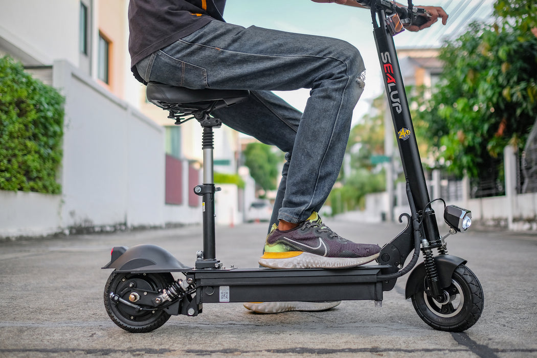 SEALUP Q9 Mini electric scooter — seated riding view